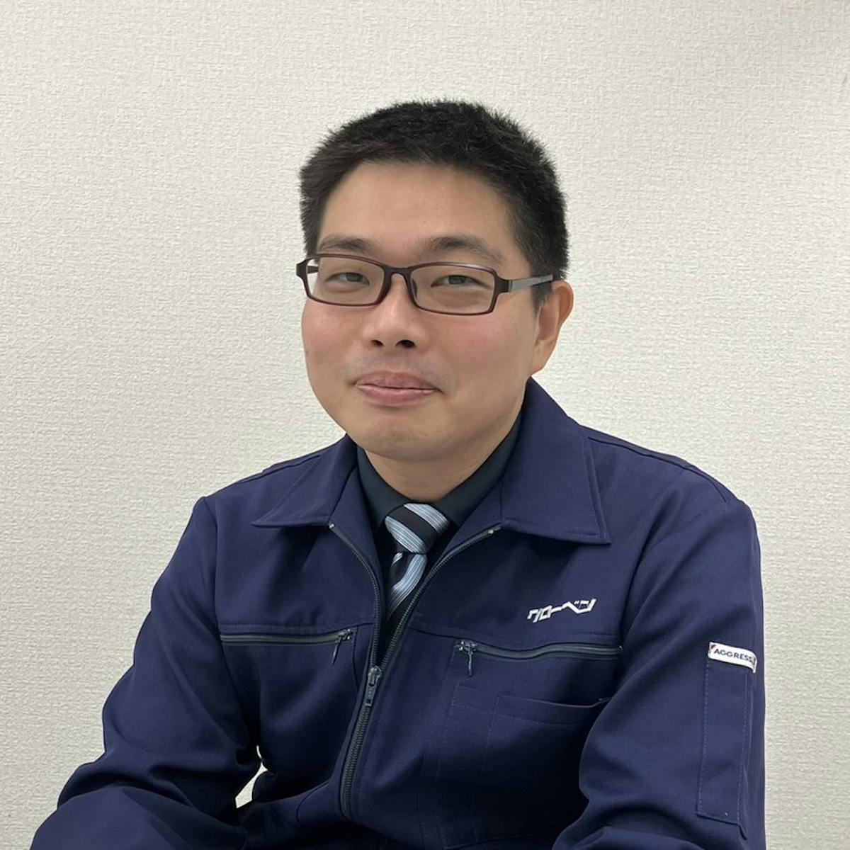 電話を受ける散水機ドットコム店長